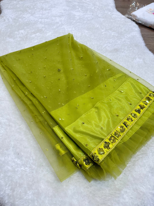 Lime green ruffle netted designer saree